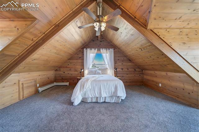 19350 Lemesany Road Calhan, CO 80808 - Photo 33 of 46 Master bedroom with wooden ceiling and vaulted ceiling
