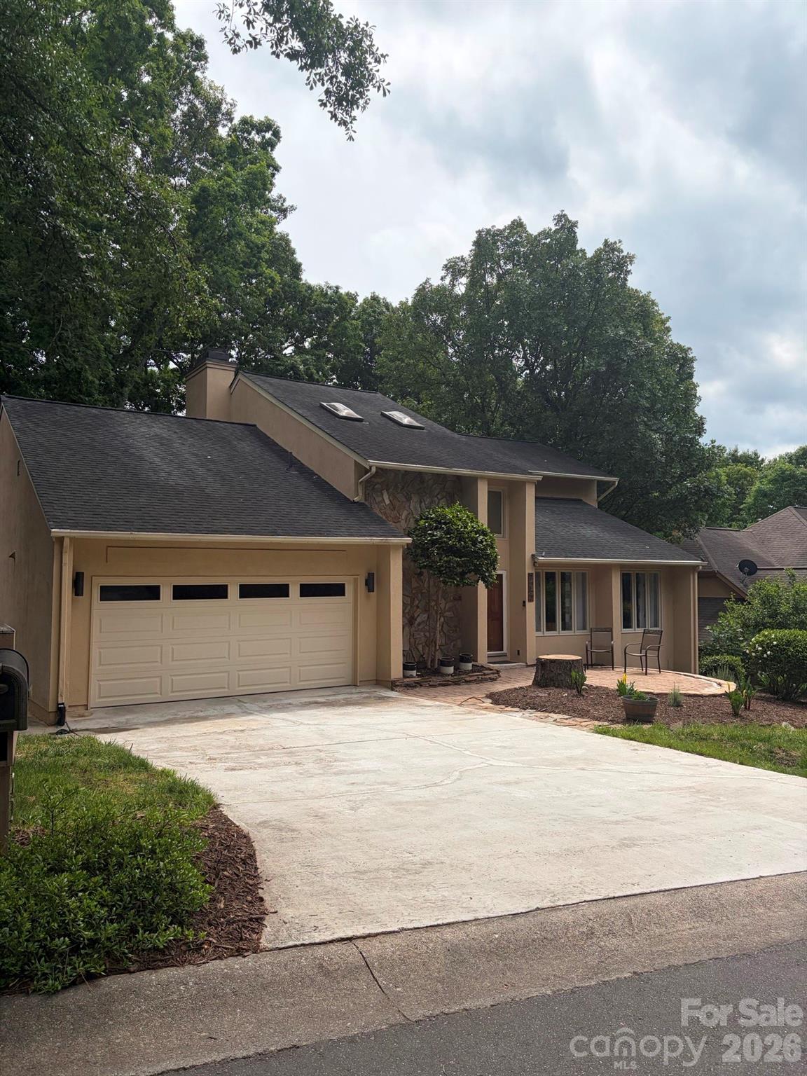 7057 Mariners Court Tega Cay, SC 29708 - Photo 2 of 2 front view of a house with a patio