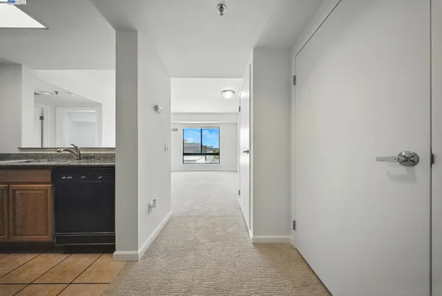 a view of a kitchen cabinets and a stove top oven