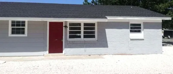 a front view of a house with windows