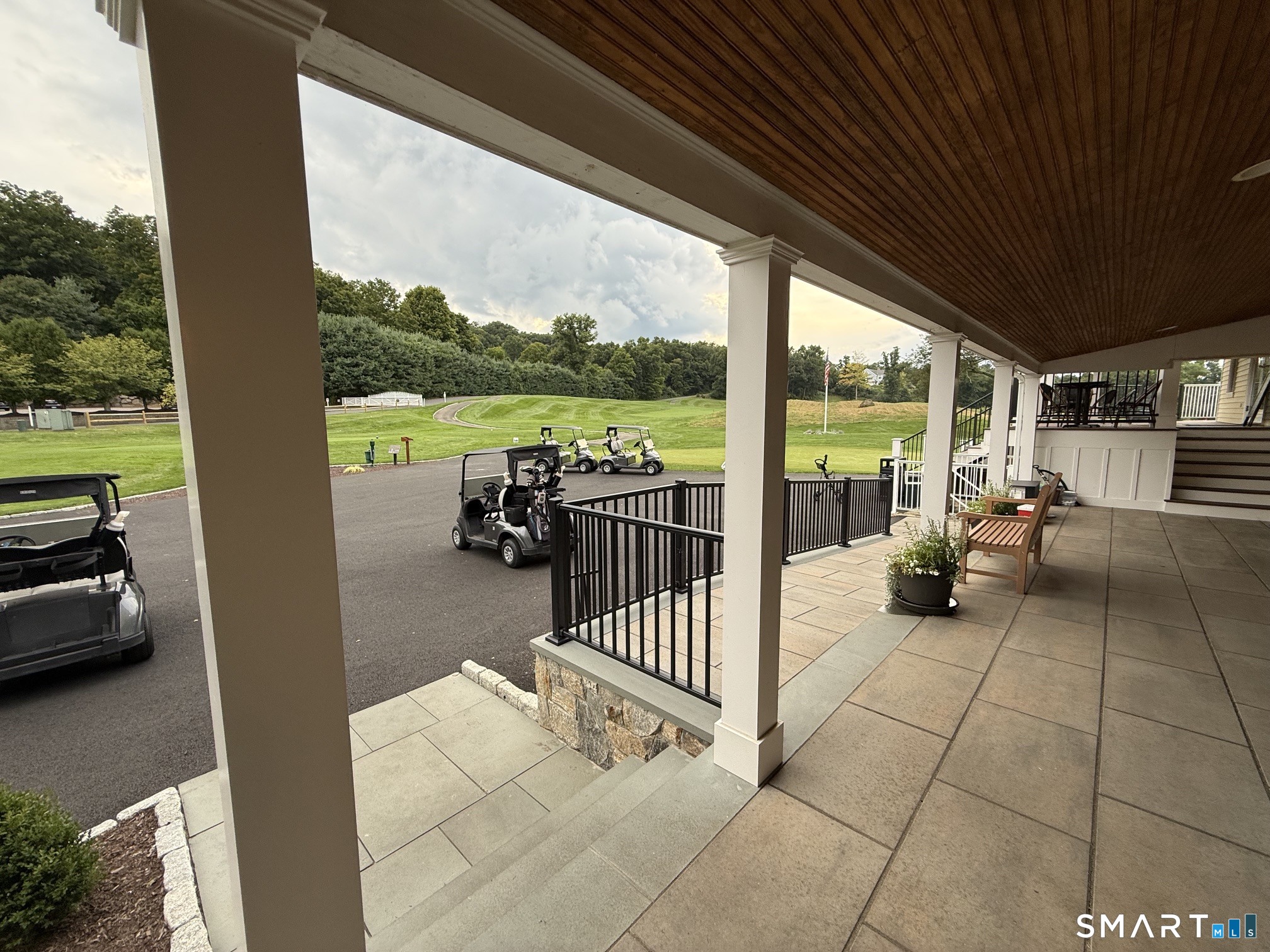 97 Long River Road Sherman, CT 06784 - Photo 24 of 29 Porch on the Club House with your golf cart waiting for you.