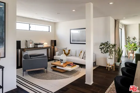 a living room with furniture and a couch