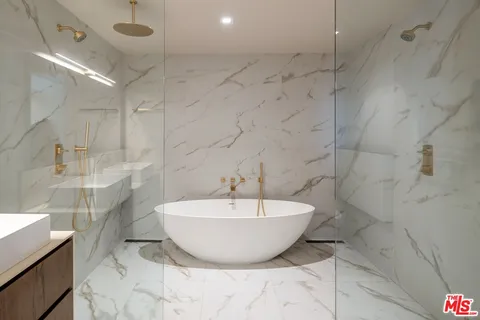 a view of a bathtub in a bathroom