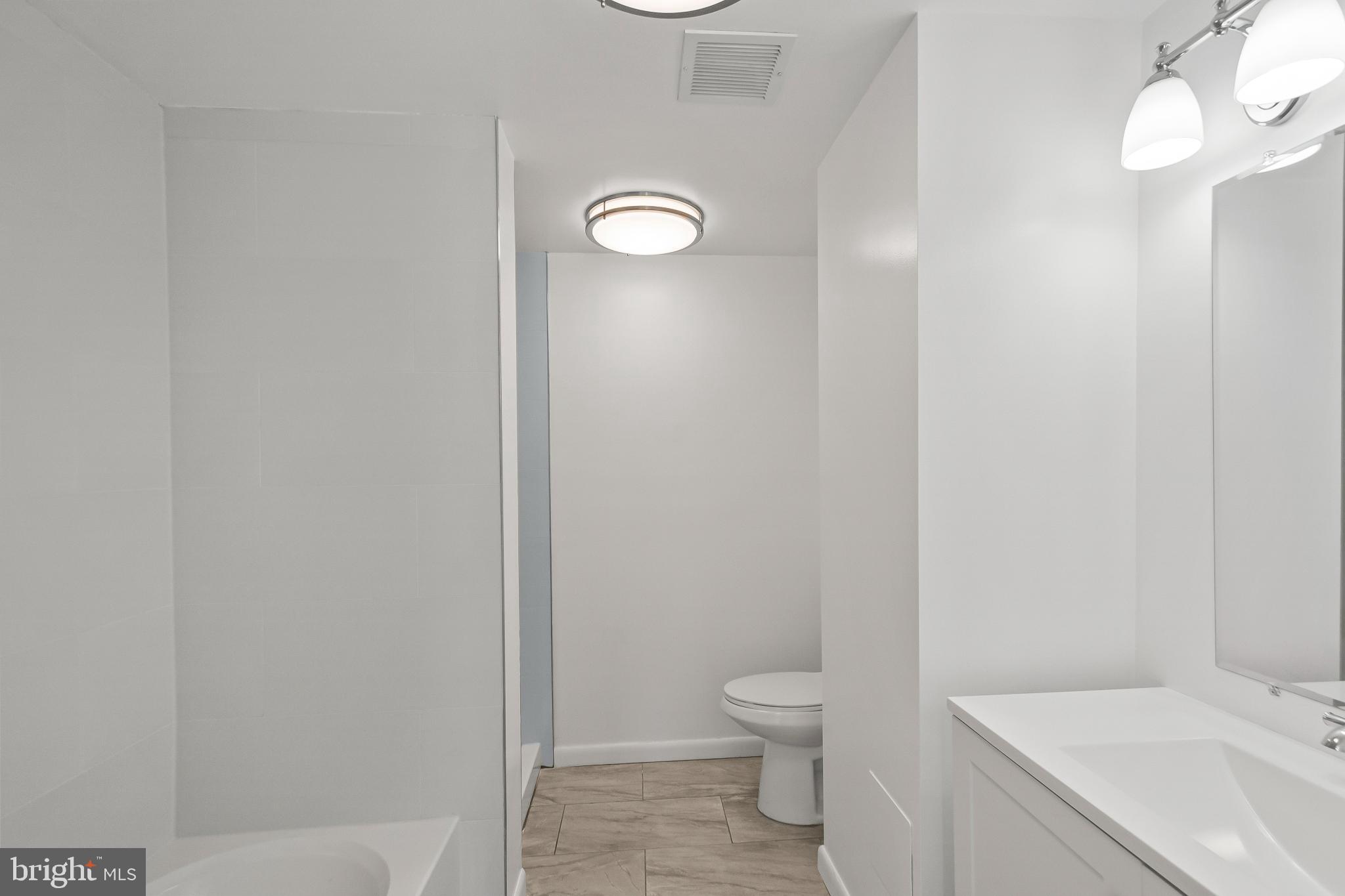 3601 Clarks Lane, Unit 322 Baltimore, MD 21215 - Photo 13 of 38 Full bathroom attached to BD1. 2 of 2 double sinks