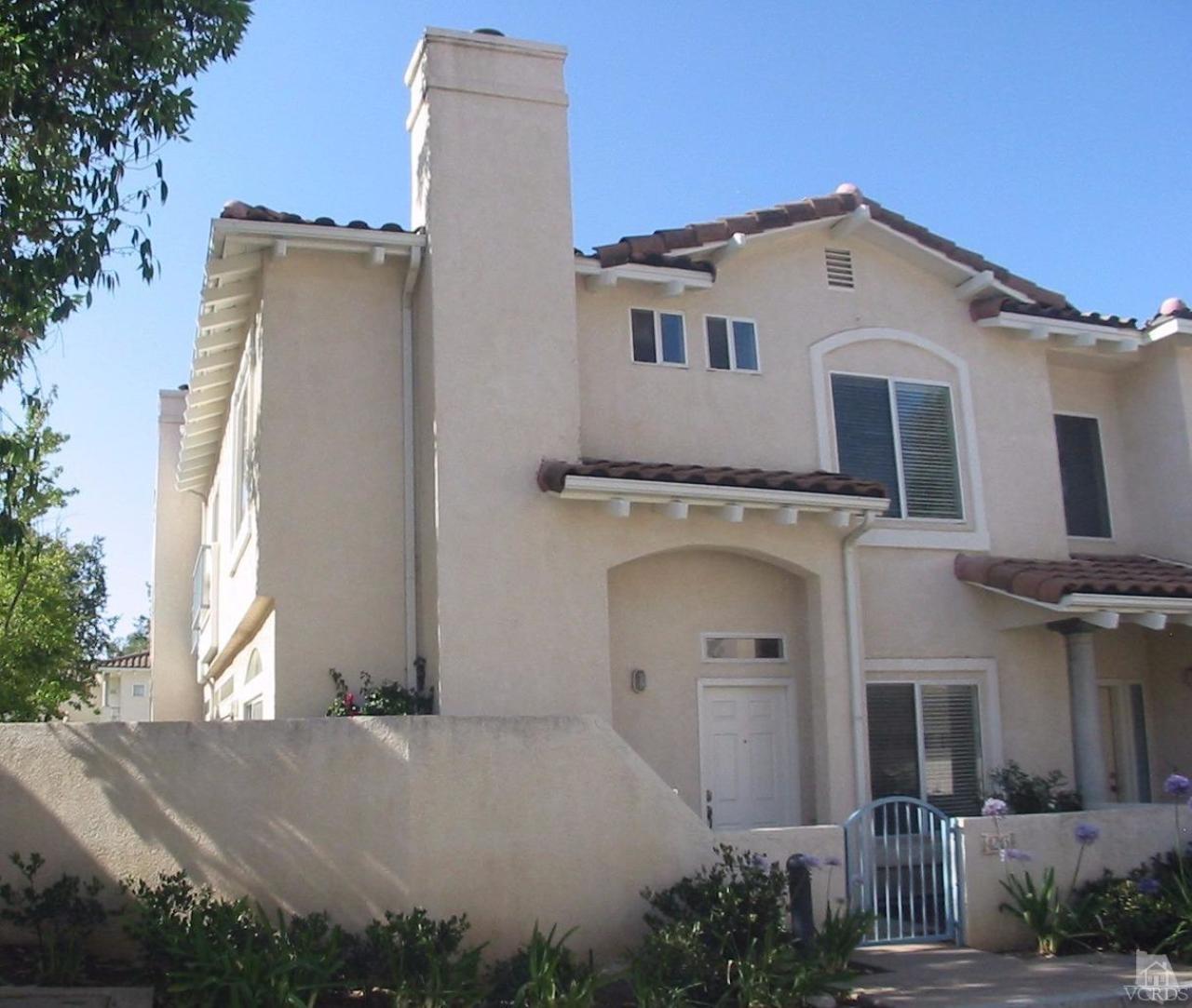 4243 Rusticview Court Moorpark, CA 93021 - Photo 1 of 16 a front view of a house with a yard