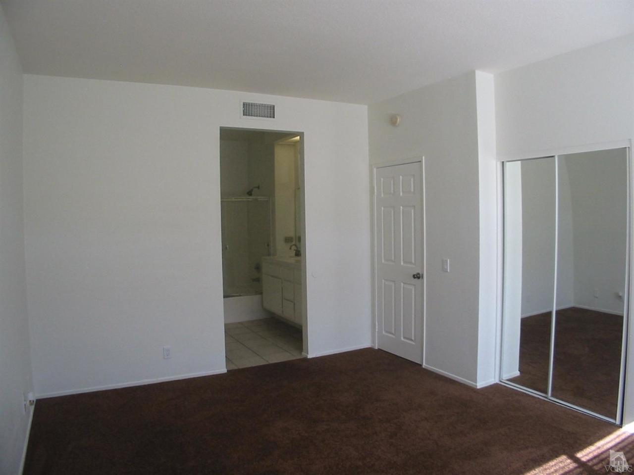 4243 Rusticview Court Moorpark, CA 93021 - Photo 12 of 16 a view of a room with a wardrobe space