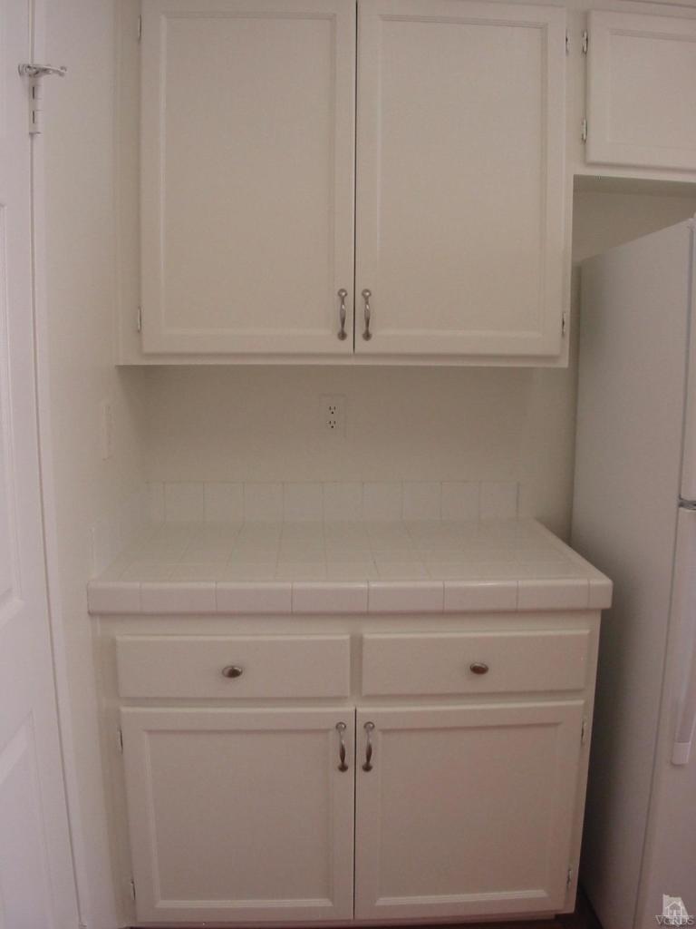 4243 Rusticview Court Moorpark, CA 93021 - Photo 5 of 16 a close view of washer and dryer