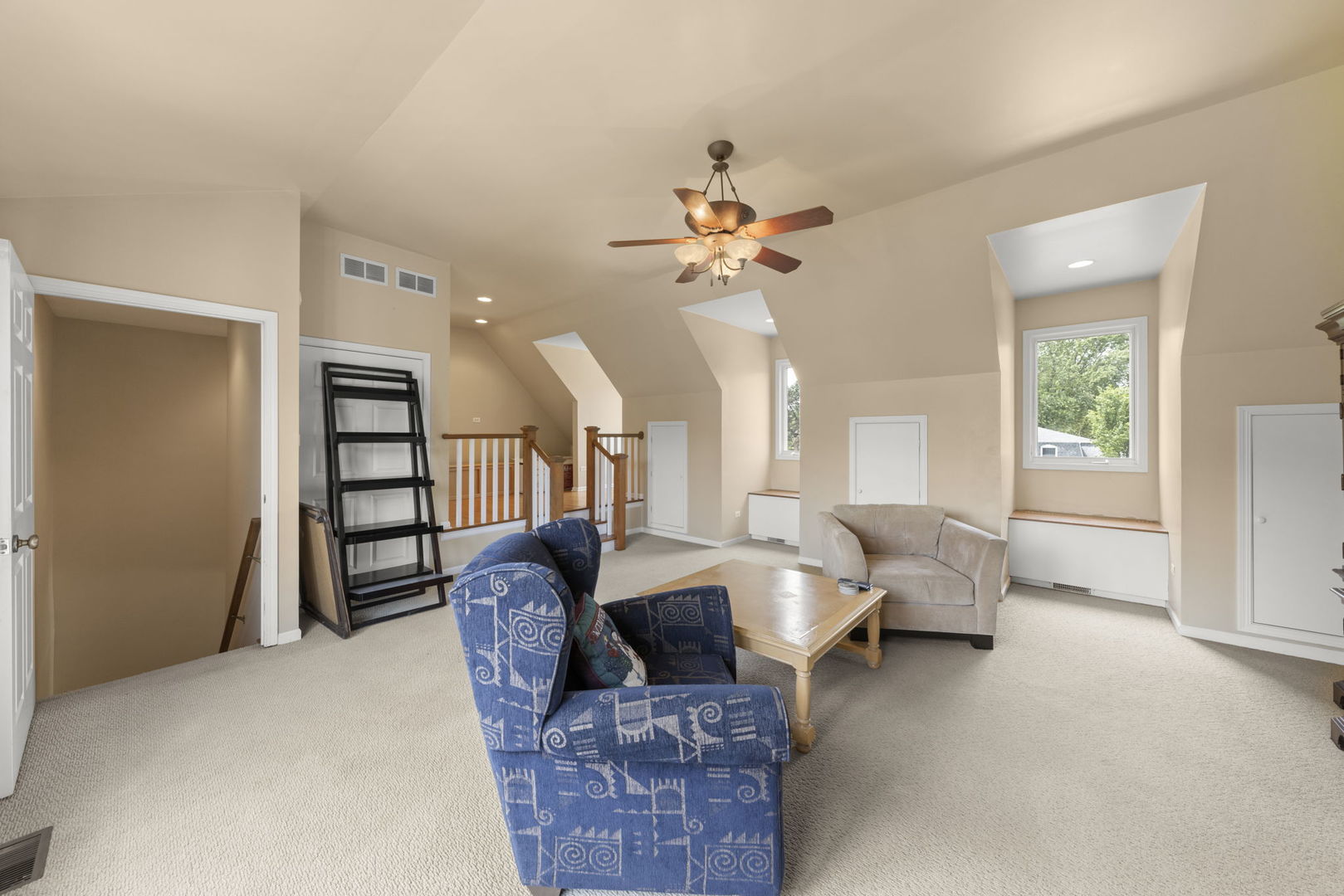 1635 South Prospect Street Wheaton, IL 60189 - Photo 16 of 53 a living room with furniture stairs and a window