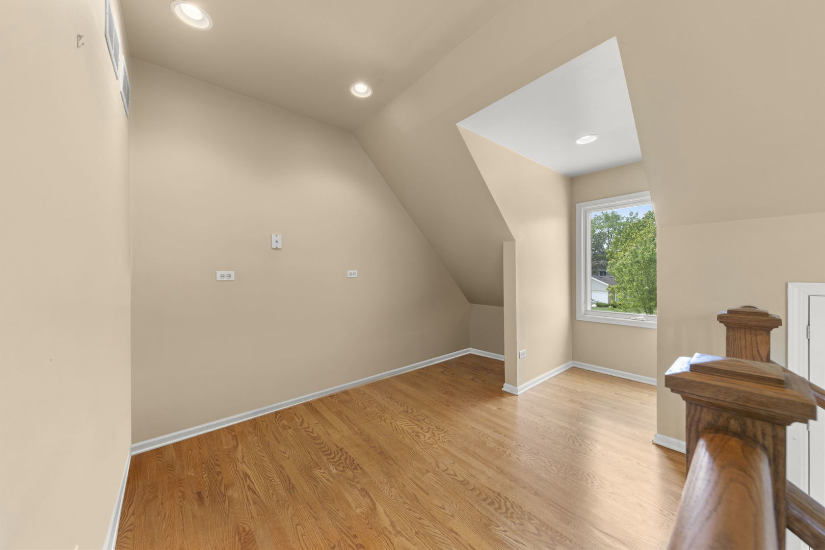 1635 South Prospect Street Wheaton, IL 60189 - Photo 18 of 53 a view of an empty room with wooden floor and a window