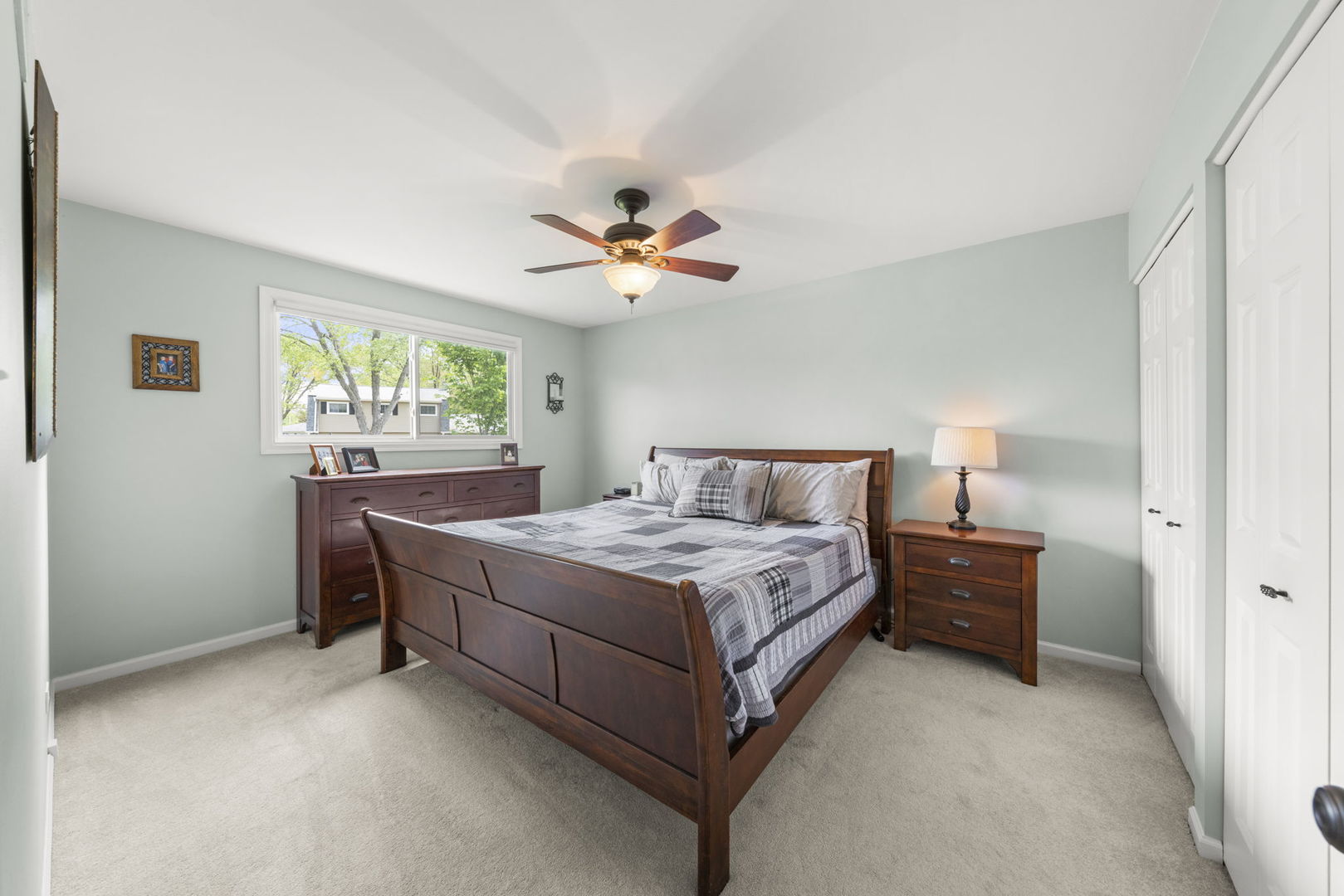1635 South Prospect Street Wheaton, IL 60189 - Photo 21 of 53 a bedroom with a bed and a chandelier