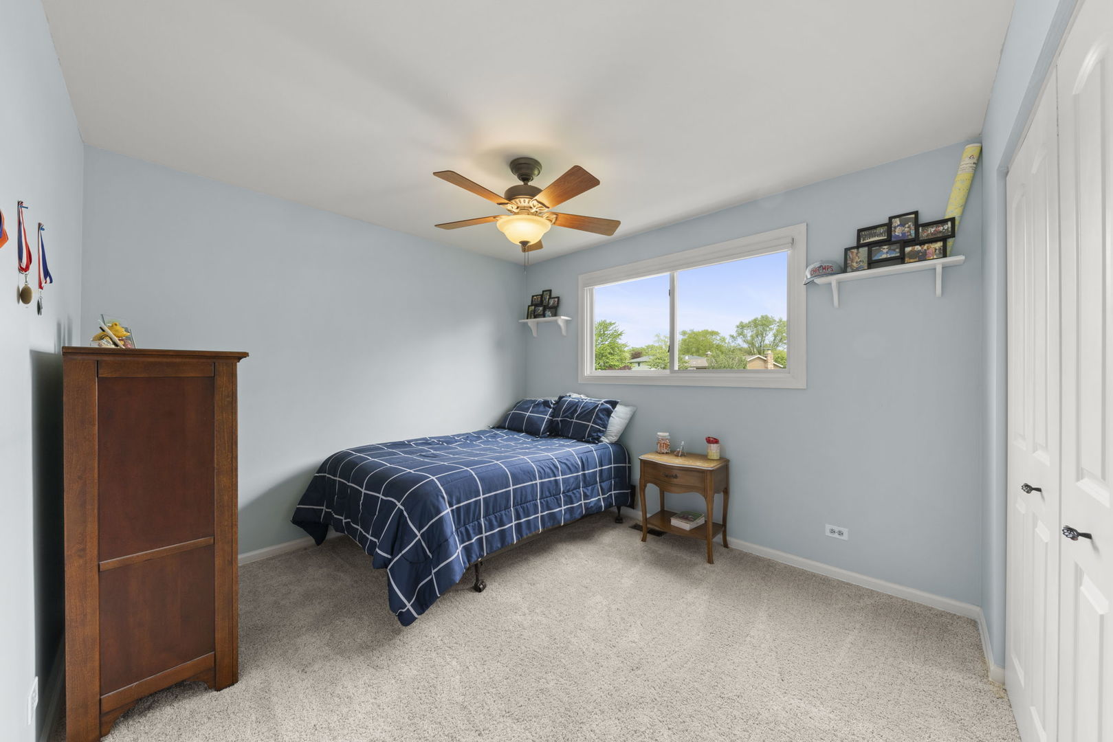 1635 South Prospect Street Wheaton, IL 60189 - Photo 25 of 53 a living room with a bed furniture and a window