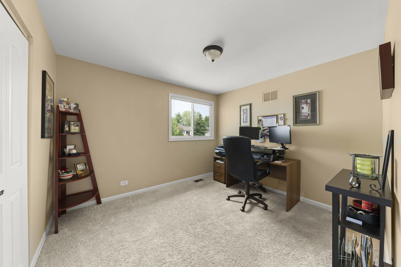 1635 South Prospect Street Wheaton, IL 60189 - Photo 26 of 53 a view of a workspace with furniture and a window