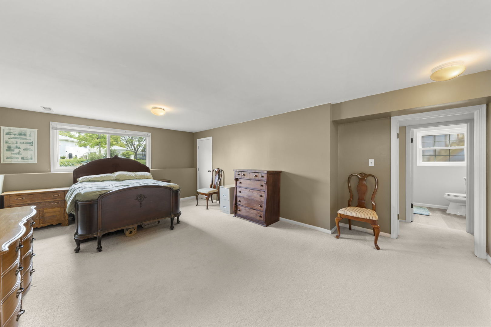 1635 South Prospect Street Wheaton, IL 60189 - Photo 28 of 53 a bedroom with a bed and a chair