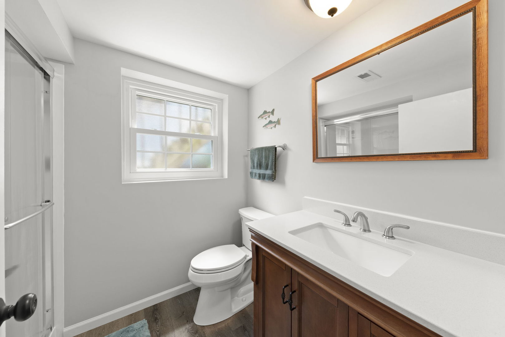 1635 South Prospect Street Wheaton, IL 60189 - Photo 29 of 53 a bathroom with a toilet sink and mirror