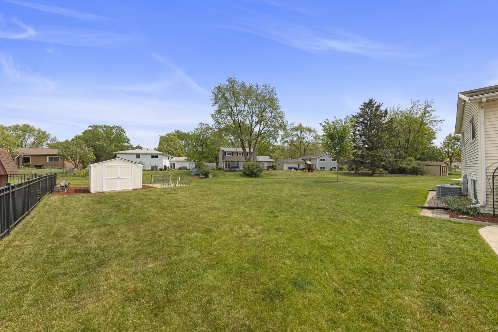 1635 South Prospect Street Wheaton, IL 60189 - Photo 35 of 53 a backyard of a house with lots of green space