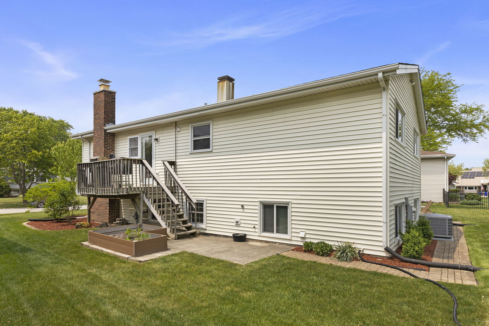 1635 South Prospect Street Wheaton, IL 60189 - Photo 39 of 53 a front view of a house with a yard
