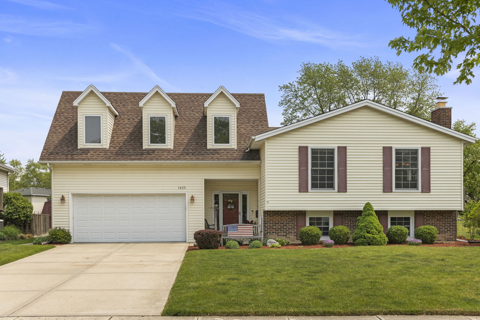 1635 South Prospect Street Wheaton, IL 60189 - Photo 52 of 53 a front view of a house with a yard