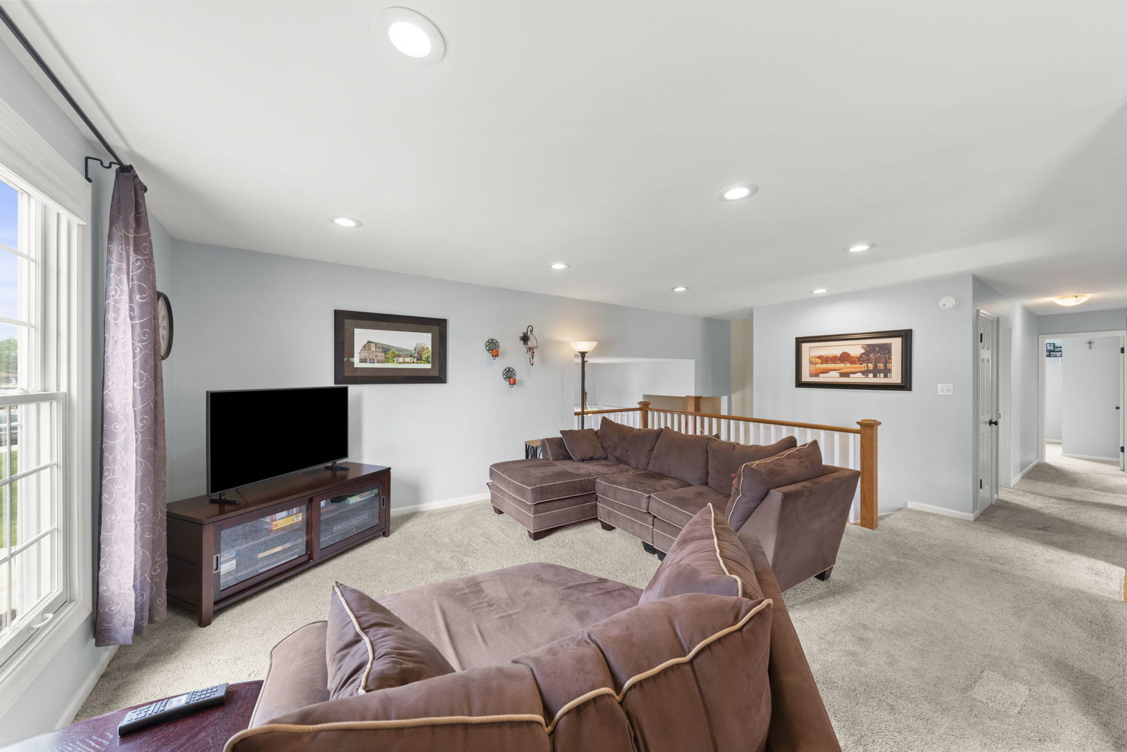 1635 South Prospect Street Wheaton, IL 60189 - Photo 6 of 53 a living room with furniture and a flat screen tv