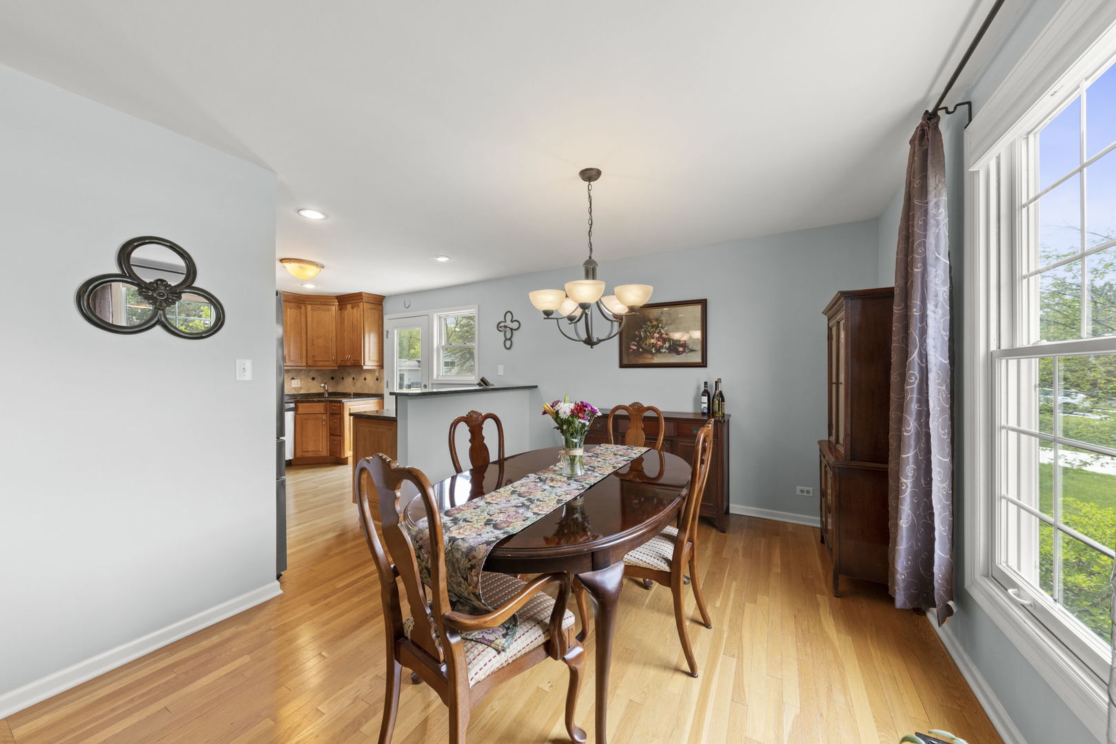 1635 South Prospect Street Wheaton, IL 60189 - Photo 10 of 53 a view of a dining room with furniture window and outside view