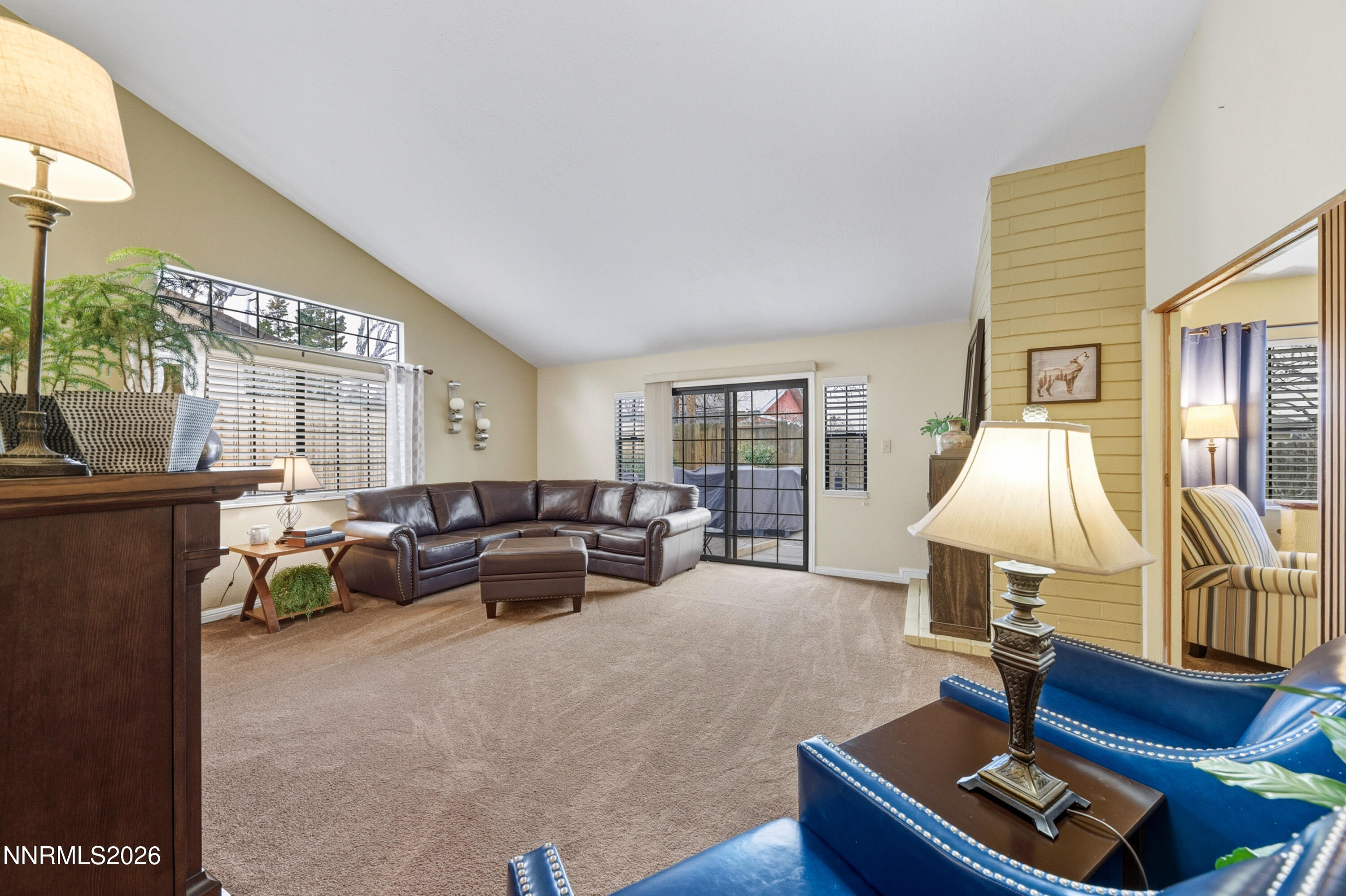 1540 O Farrell Street Reno, NV 89503 - Photo 14 of 41 a living room with furniture gym equipment and a large window