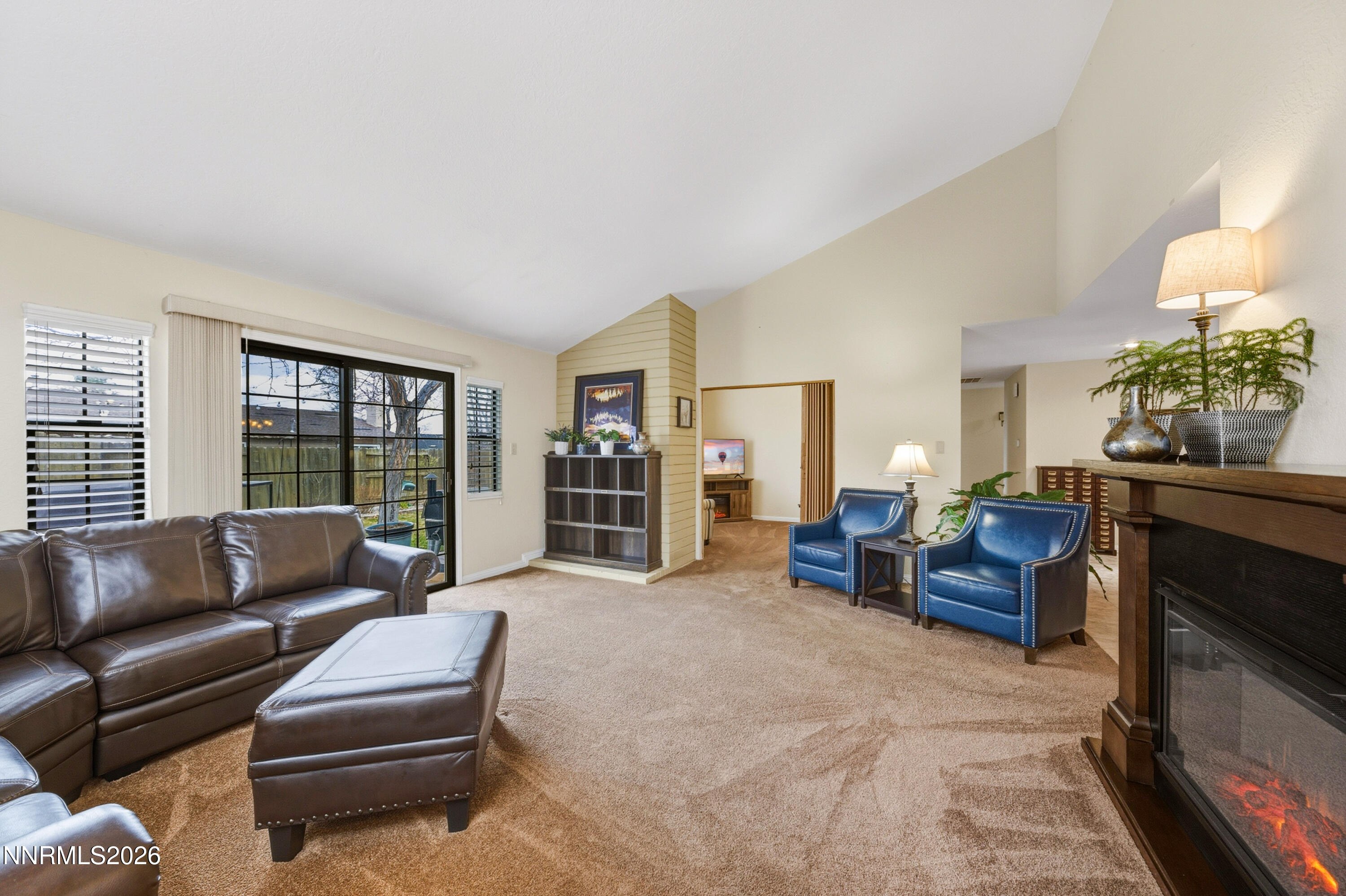 1540 O Farrell Street Reno, NV 89503 - Photo 17 of 41 a living room with furniture and a fireplace