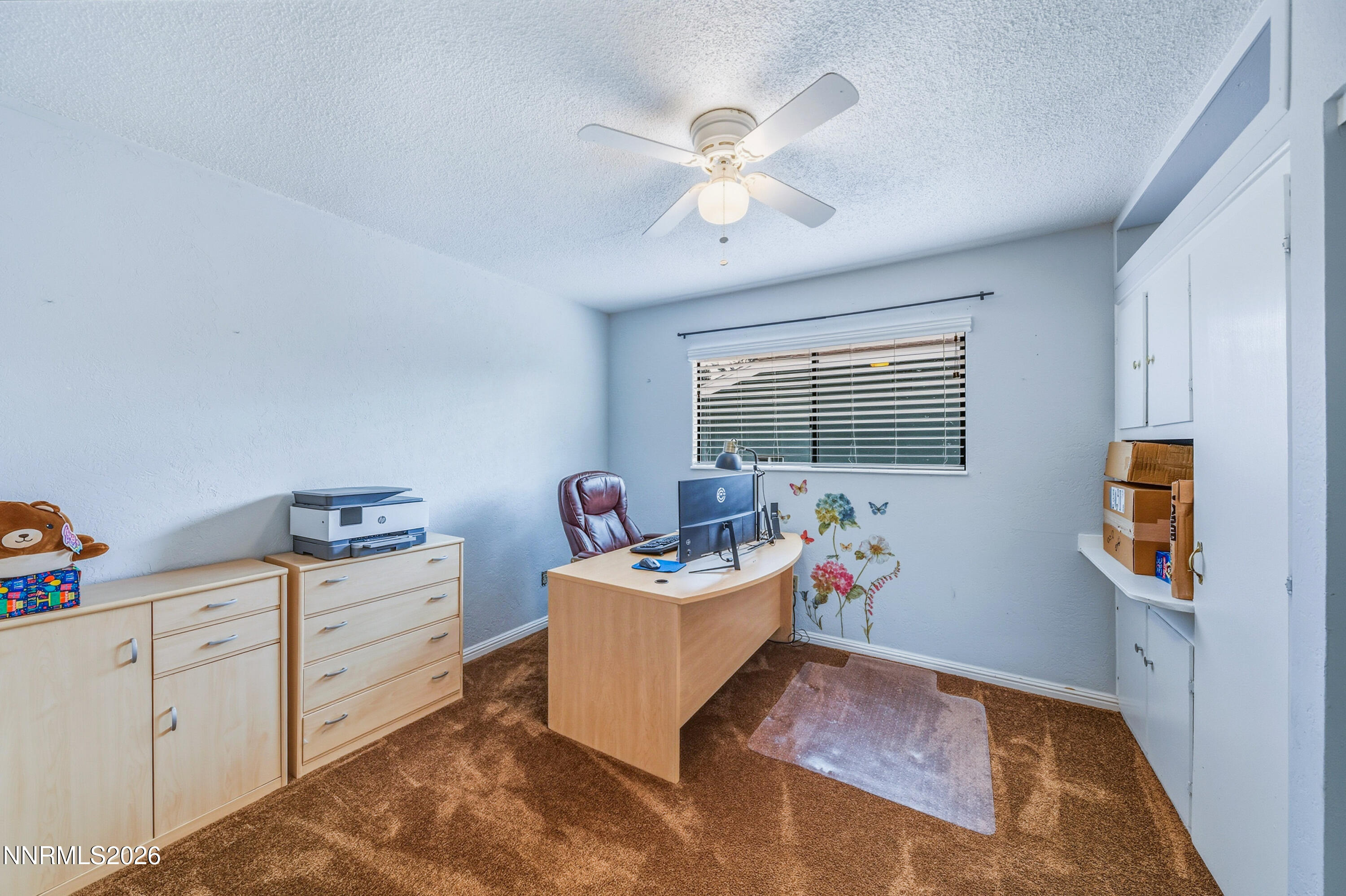 1540 O Farrell Street Reno, NV 89503 - Photo 19 of 41 a living room with furniture and a window