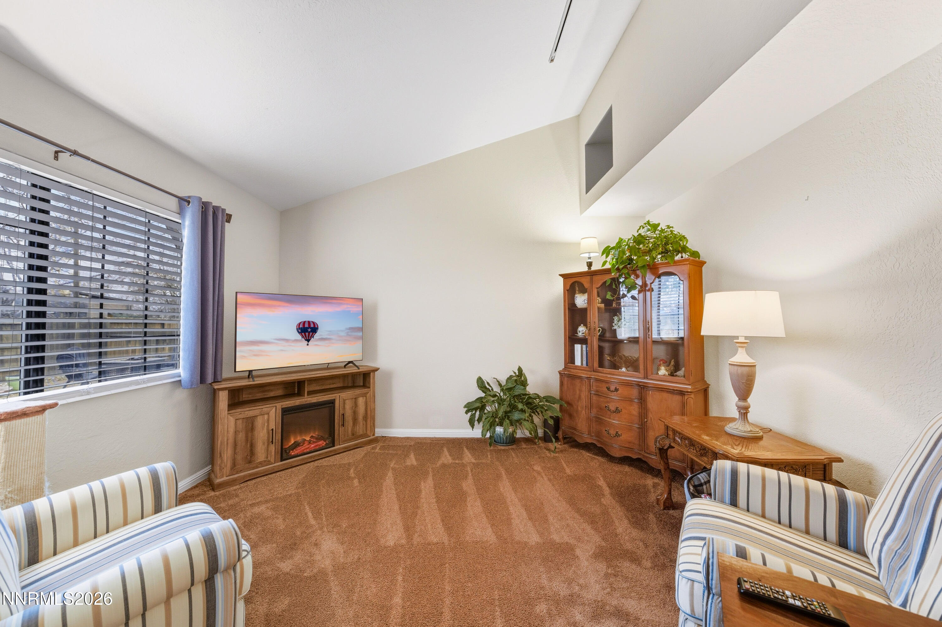 1540 O Farrell Street Reno, NV 89503 - Photo 21 of 41 a bed room with furniture and a flat screen tv