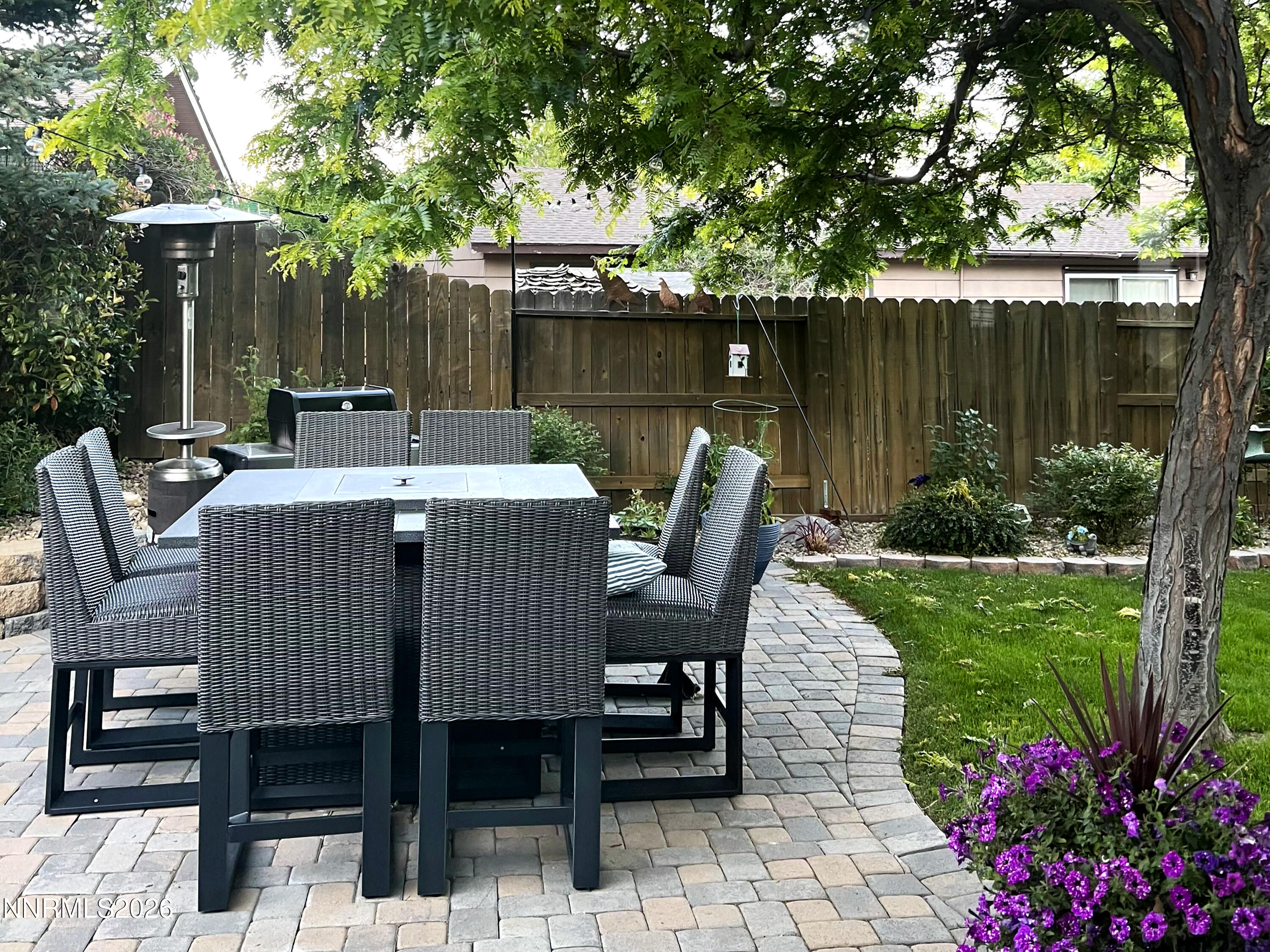1540 O Farrell Street Reno, NV 89503 - Photo 26 of 41 a view of a patio with a table chairs and a backyard