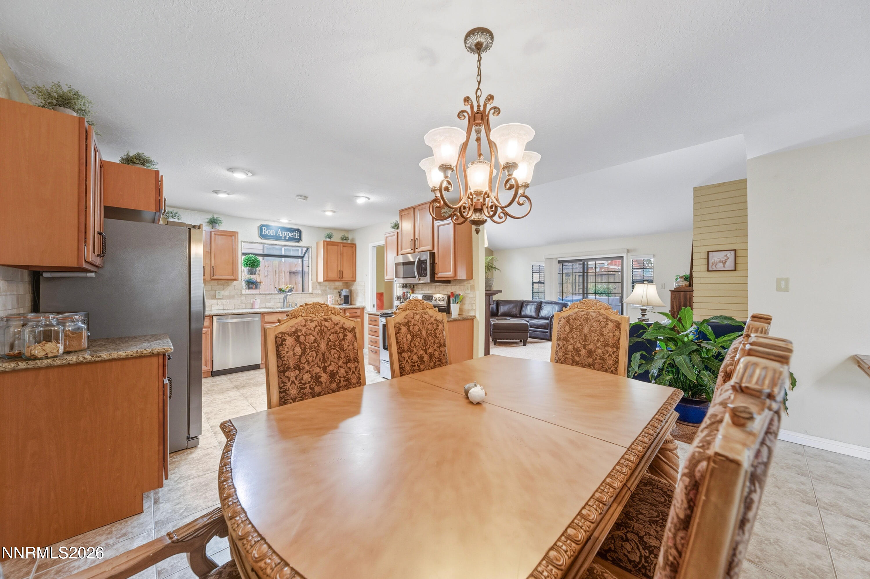 1540 O Farrell Street Reno, NV 89503 - Photo 7 of 41 a view of a dining room with furniture and chandelier
