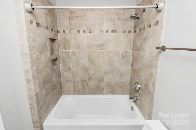 a bathroom with a bathtub