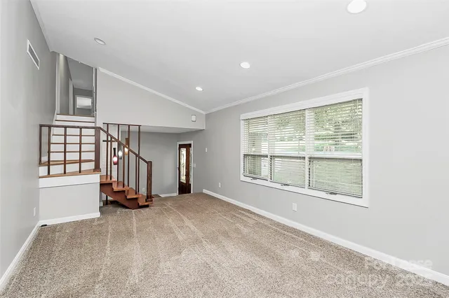 an empty room with windows