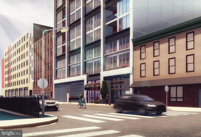 an aerial view of a building with outdoor space