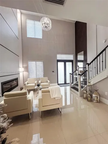 a bed room with a bed and a chair