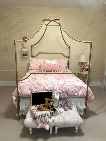 a view of kitchen island dining room wooden floor furniture and a chandelier