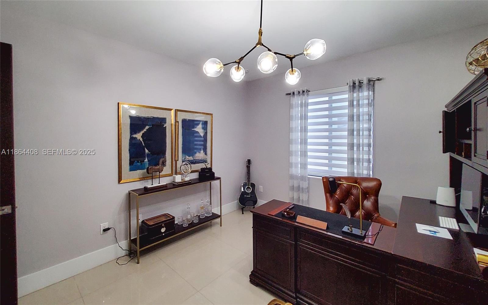 14680 Southwest 17th Street Miami, FL 33175 - Photo 65 of 68 a room with chandelier furniture and a window
