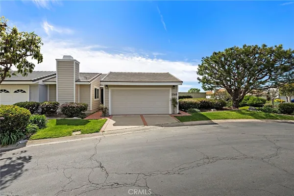 front view of a house with a street