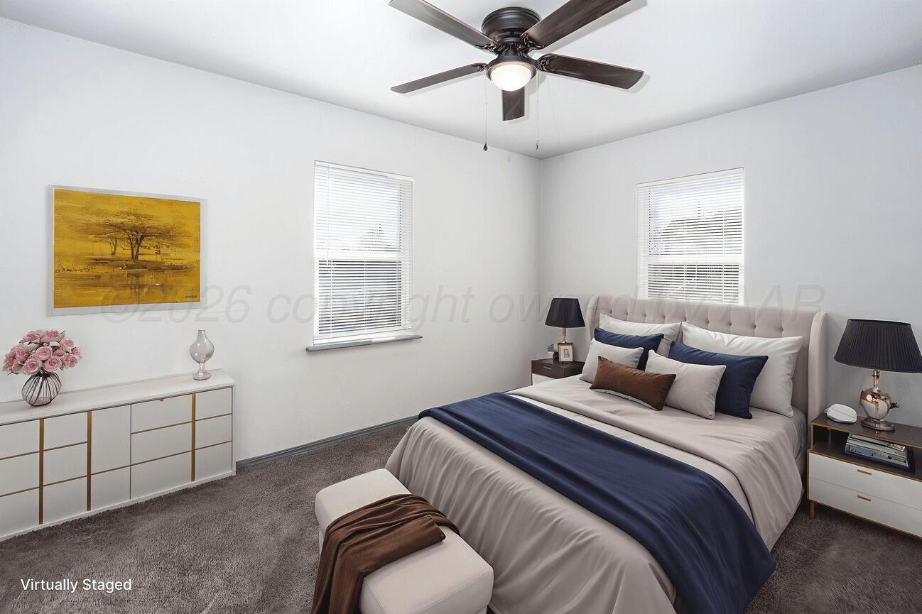 4224 South Polk Street Amarillo, TX 79110 - Photo 27 of 55 a bedroom with a bed and a window