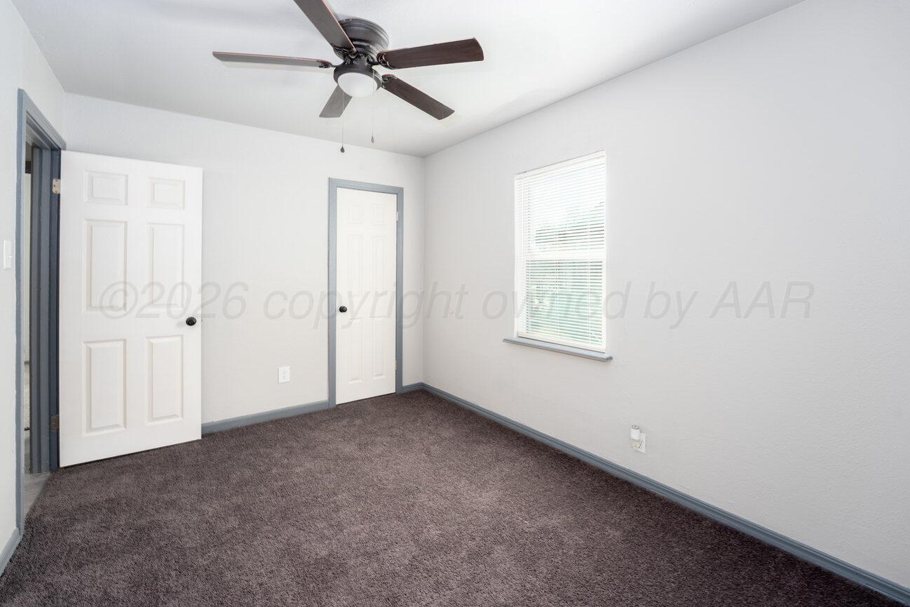 4224 South Polk Street Amarillo, TX 79110 - Photo 32 of 55 a view of an empty room with a window