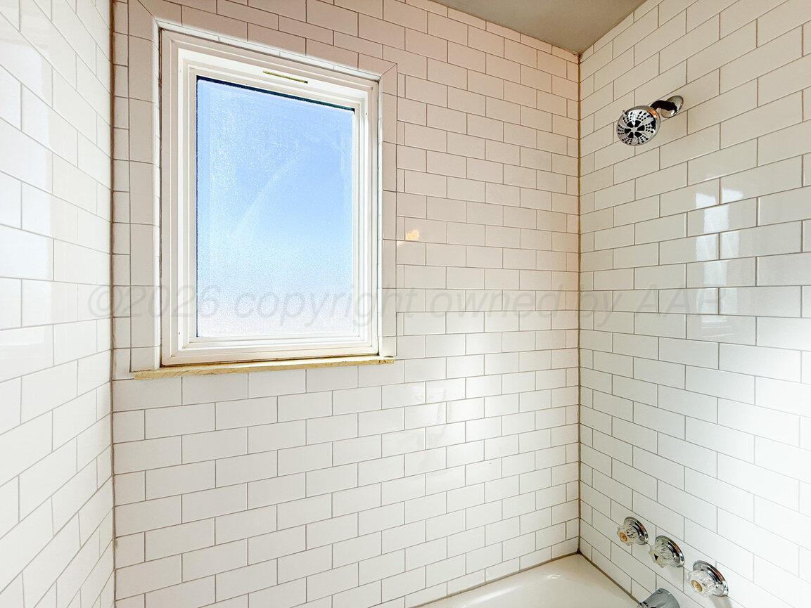 4224 South Polk Street Amarillo, TX 79110 - Photo 48 of 55 a bathroom with a shower