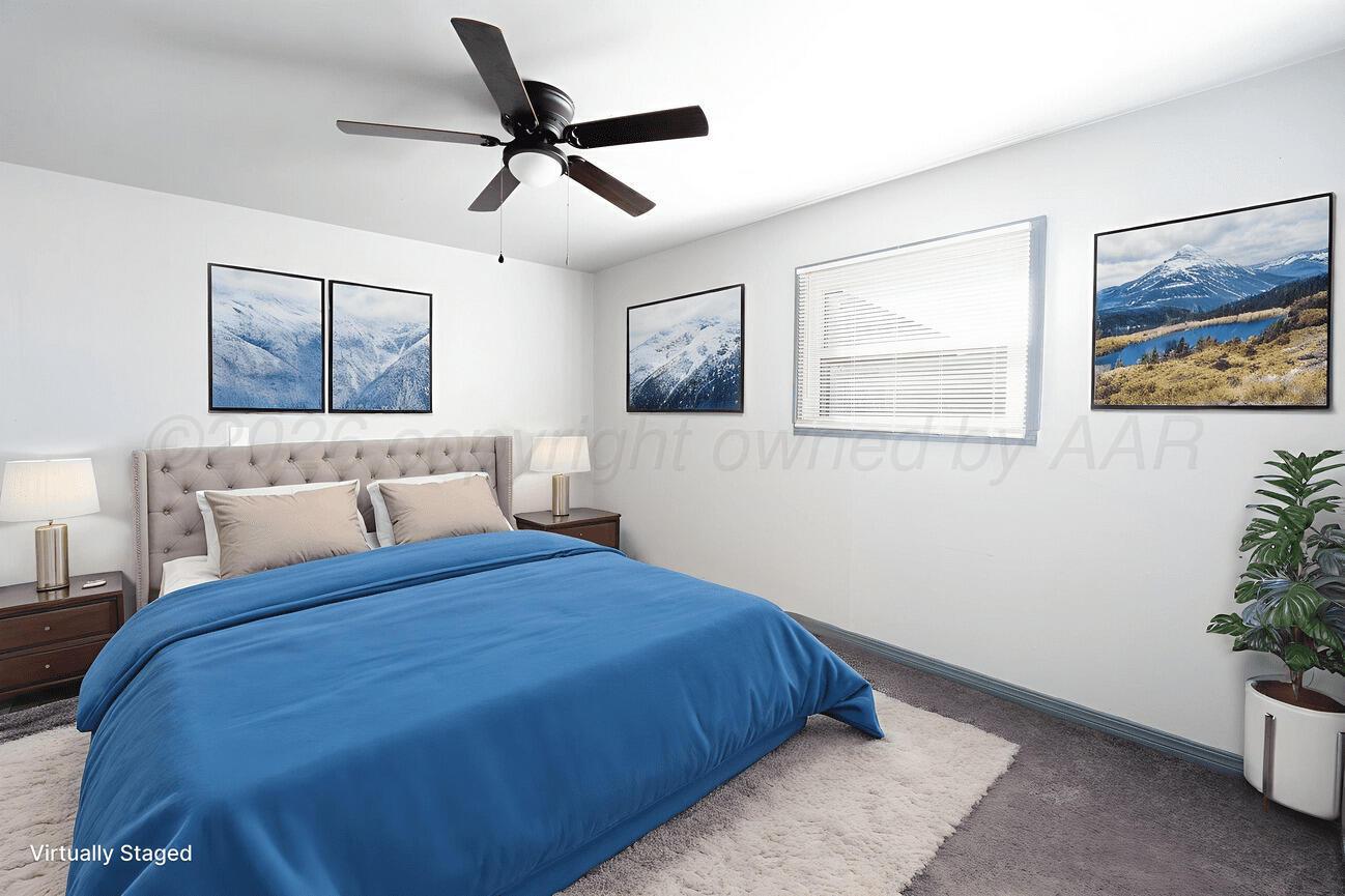 4224 South Polk Street Amarillo, TX 79110 - Photo 50 of 55 a bedroom with a bed and a painting on the wall