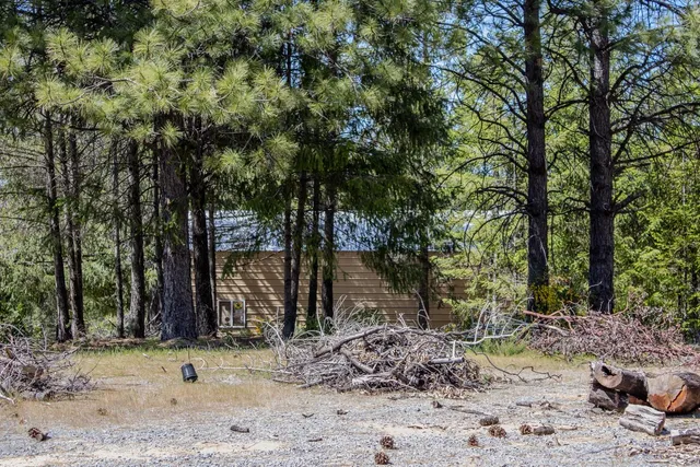 a view of a lake with a house in the background