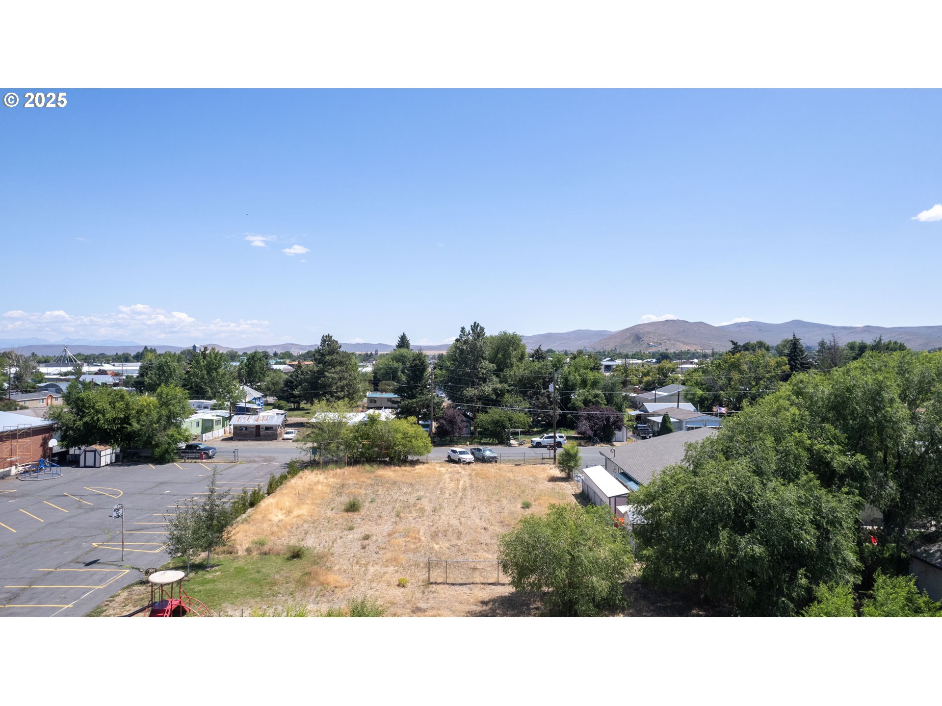 0 16th Street, Unit 2 Baker City, OR 97814 - Photo 3 of 6 a open area with outdoor seating and trees