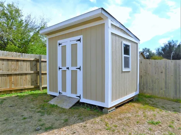 a house view with a outdoor space