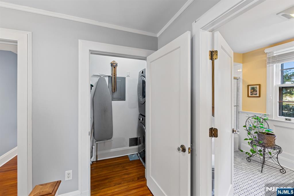 116 Lydecker Street Englewood, NJ 07631 - Photo 30 of 46 a bathroom with a shower and a sink