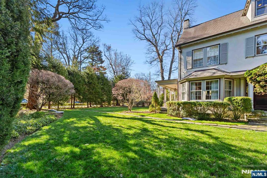 116 Lydecker Street Englewood, NJ 07631 - Photo 40 of 46 a view of a house with a yard