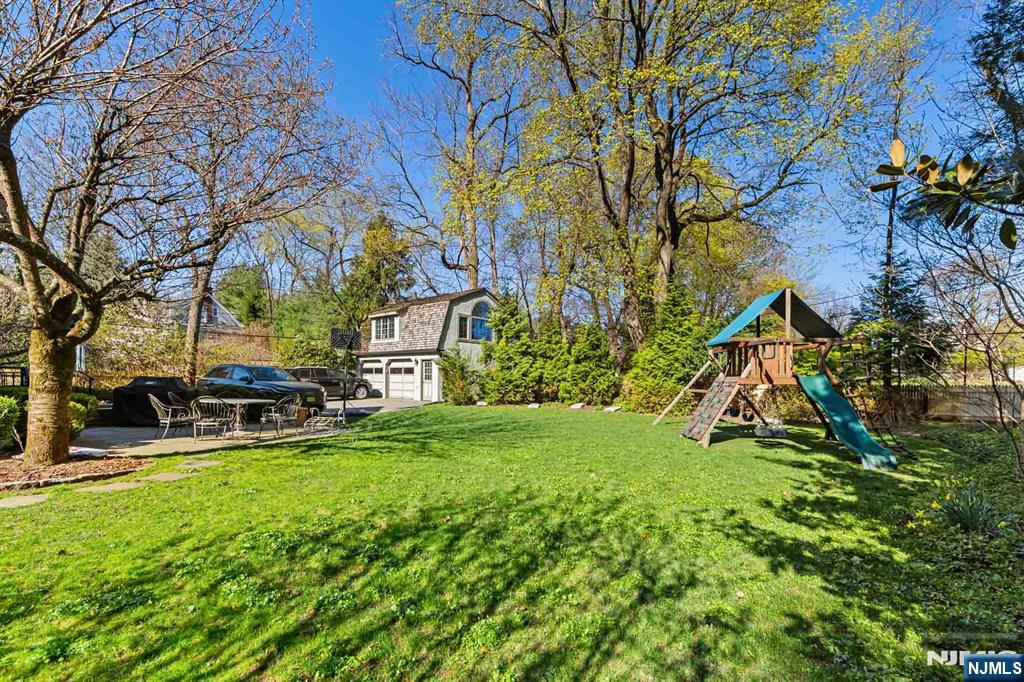 116 Lydecker Street Englewood, NJ 07631 - Photo 41 of 46 a view of a house with a yard