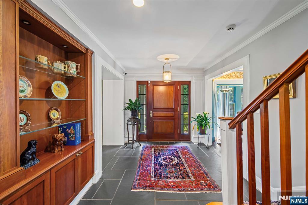 116 Lydecker Street Englewood, NJ 07631 - Photo 5 of 46 a view of an entryway with wooden floor