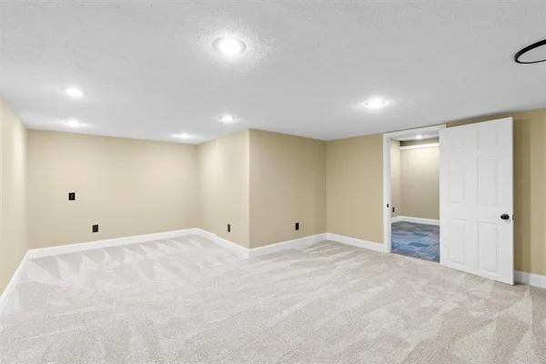 a view of room with refrigerator