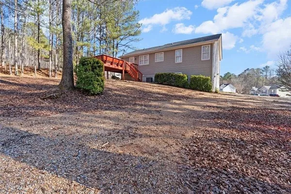 a view of house with outdoor space