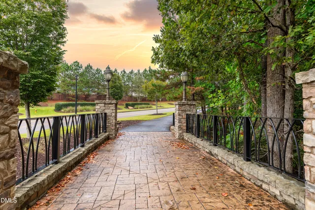 a view of a swimming pool with an outdoor space and seating area